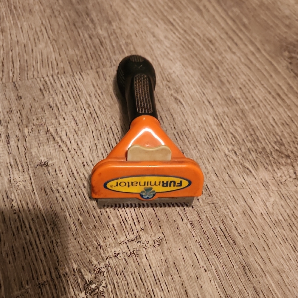 FURminator Orange Shedding Tool